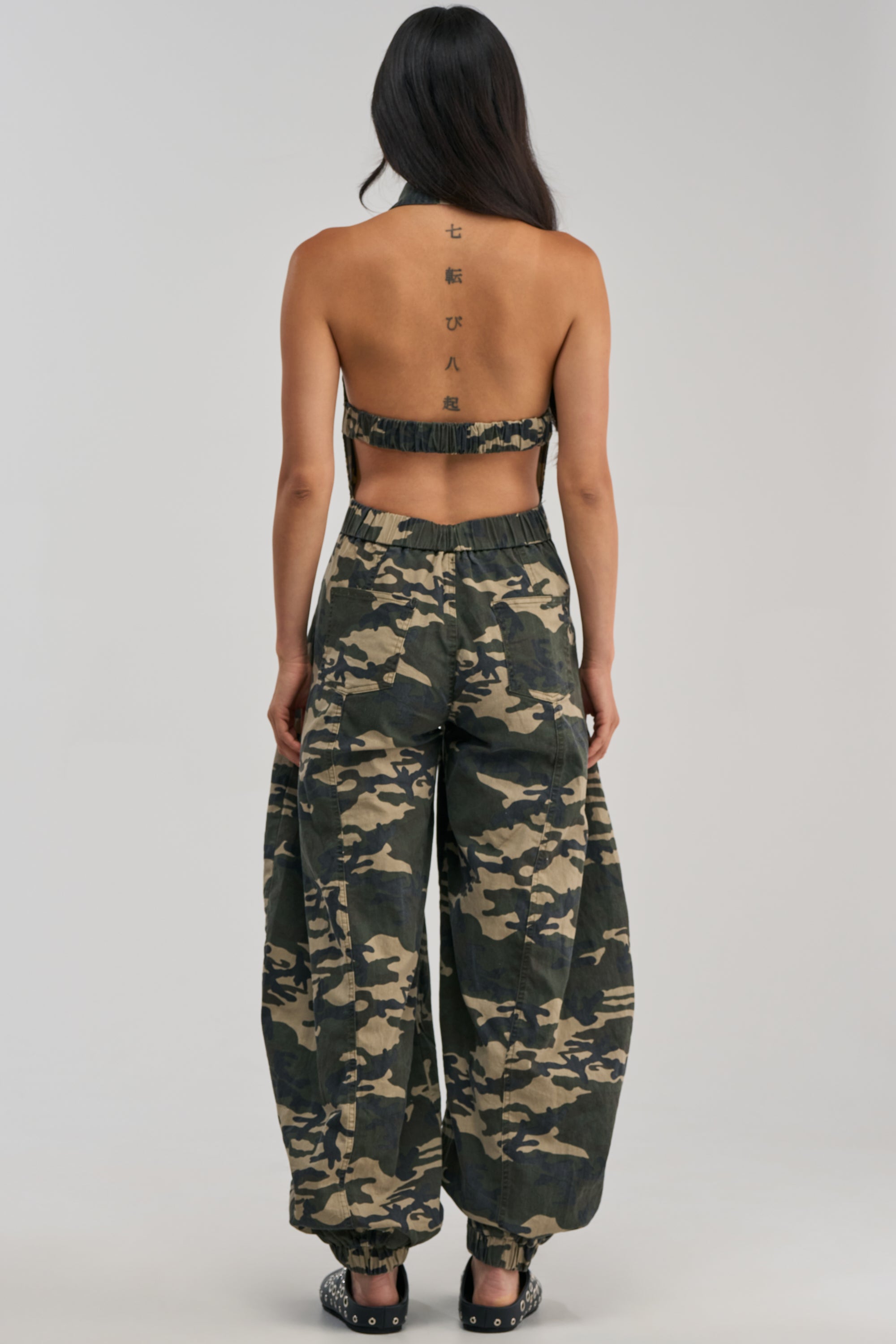 COUNT ME IN CAMO HALTER JUMPSUIT