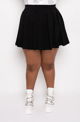 ISLAND PLEATED MINI SKIRT