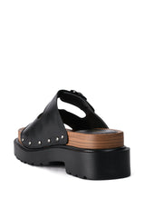 SLOW MOTION FLAT SANDAL IN BLACK