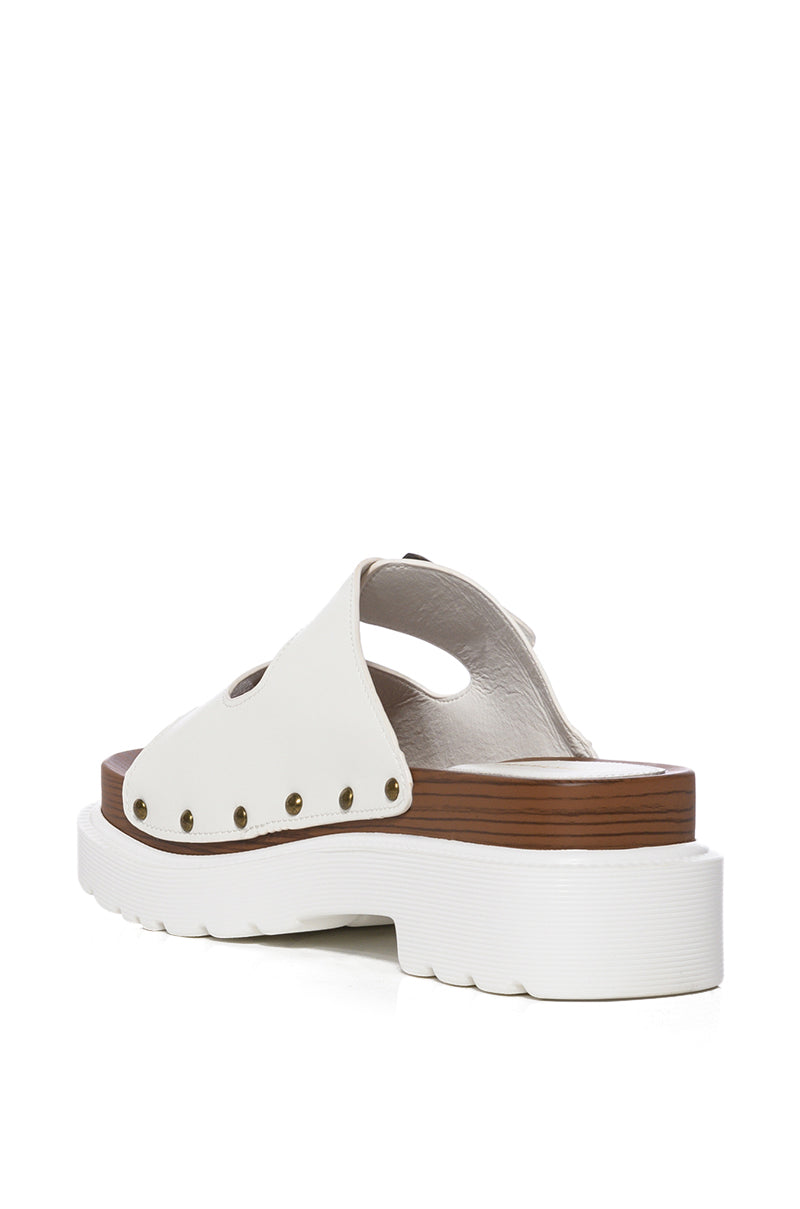 SLOW MOTION WHITE FLATFORM SANDAL