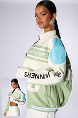 ZOOM ZOOM CONVERTIBLE BOMBER JACKET IN GREEN